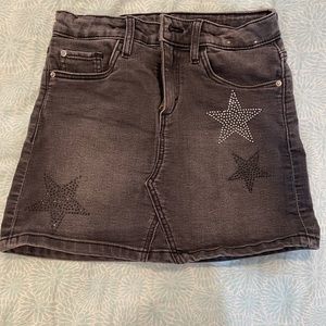Stone wash mini skirt with blinking star